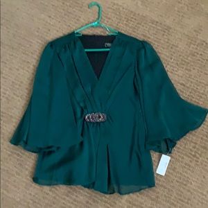 Green women’s top.